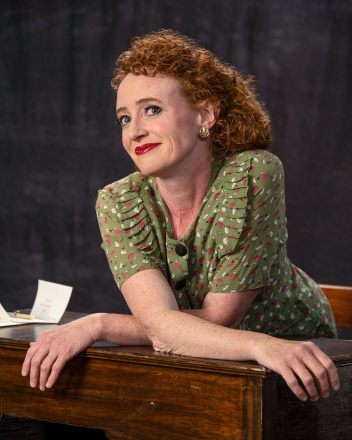 Caitlin Wise as Louise.