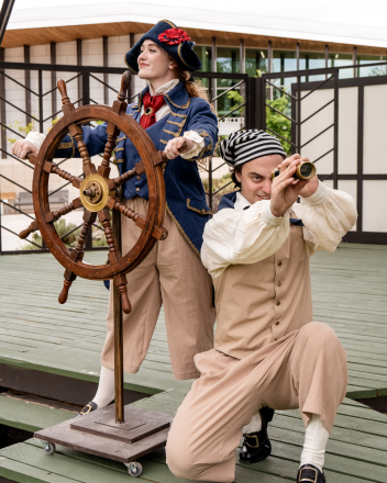 Pixie Isabel Merkley (left) and AJ Newbury as Featured Performers in Mariners Greenshow.